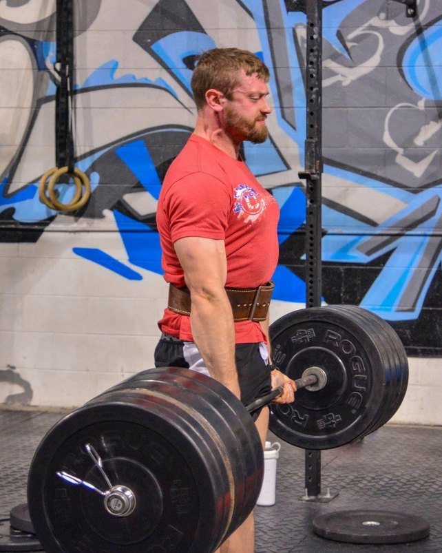 Chris Lemmel locking out a heavy deadlift
